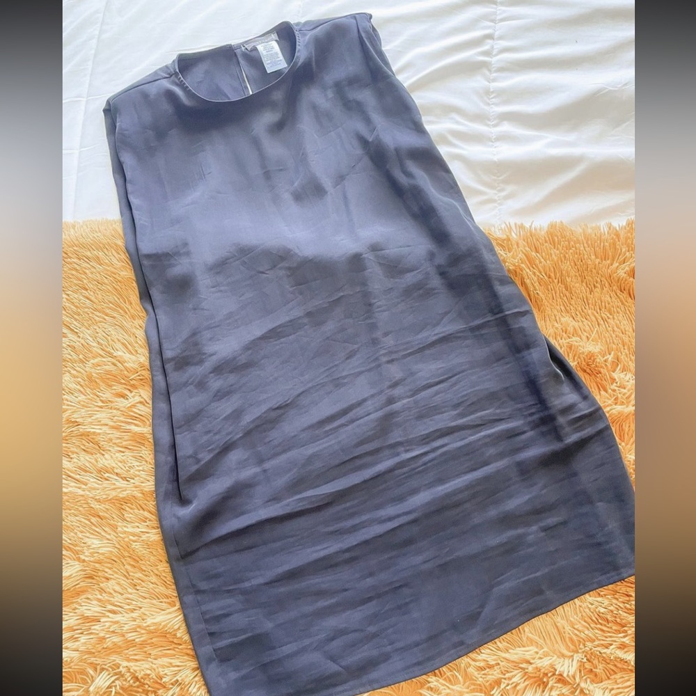 Black shoulder pad dress